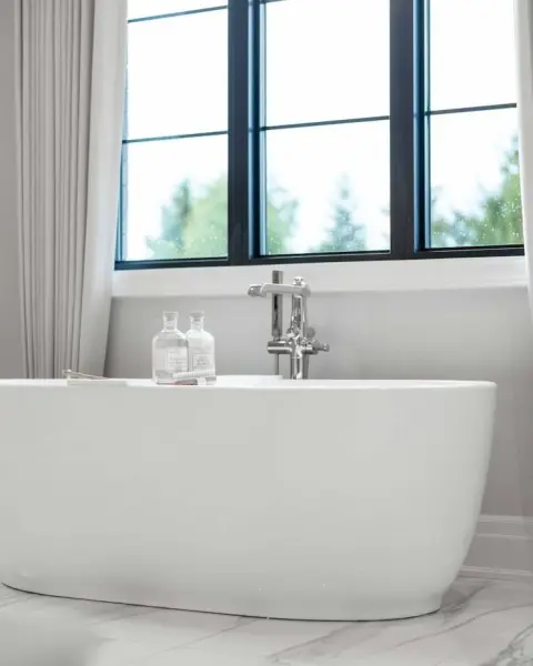 Freestanding bath in a bright bathroom