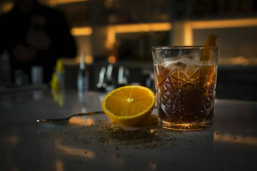 Cocktail with orange and cinnamon