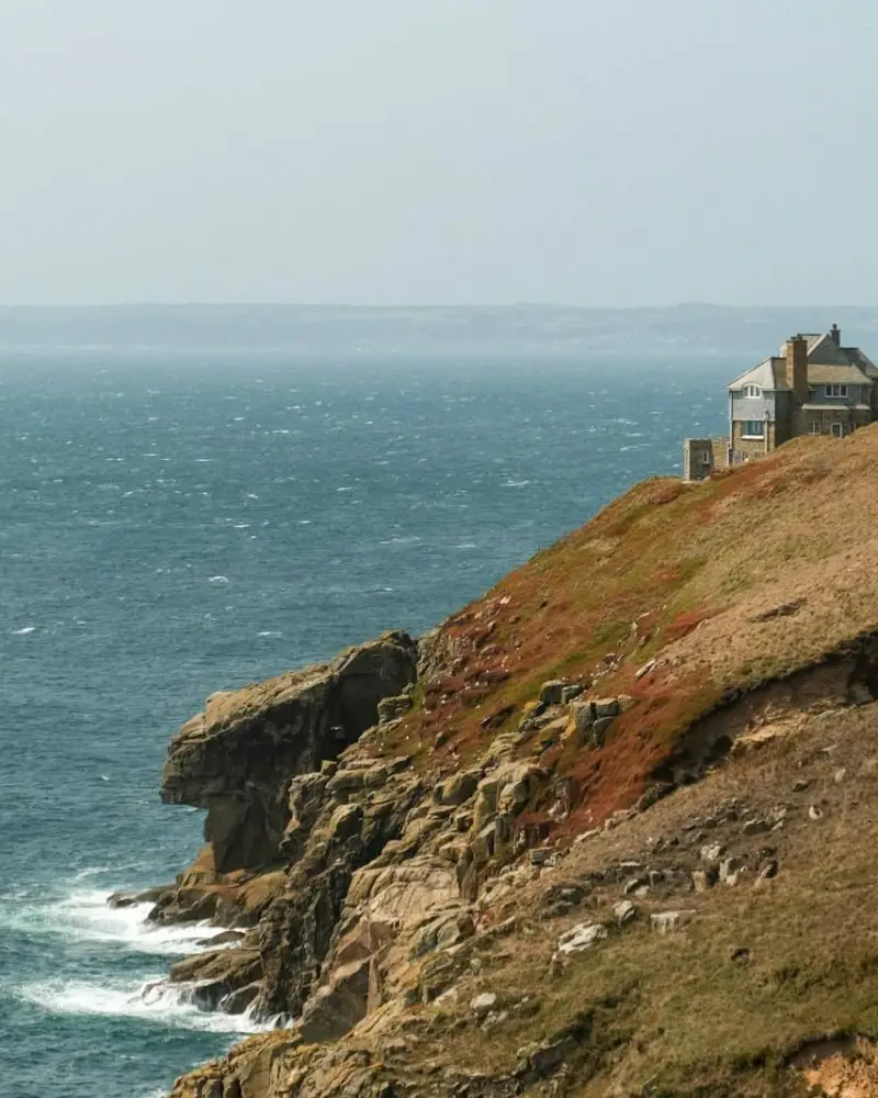Old house on a cliff overlooking the ocean