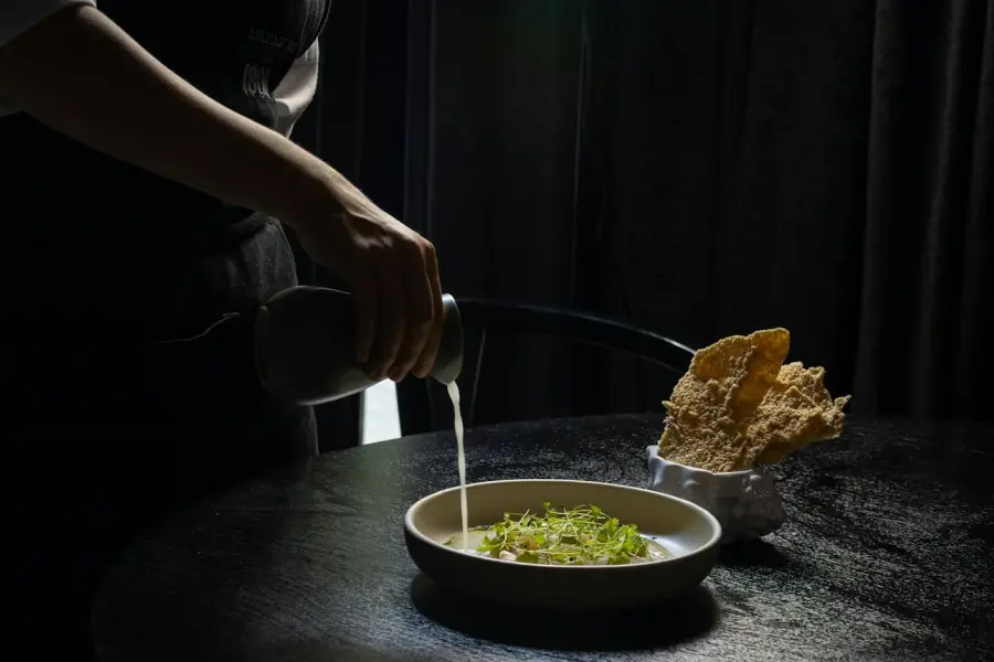 Sauce poured over a plated dish