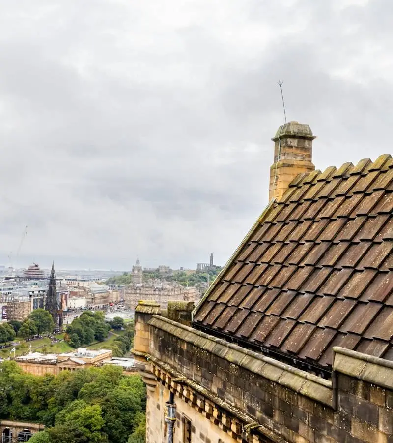 Stone roof with chimneys overlooking Edinburgh