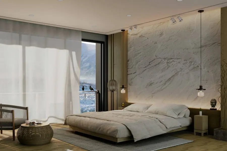 Bedroom with a marble wall
