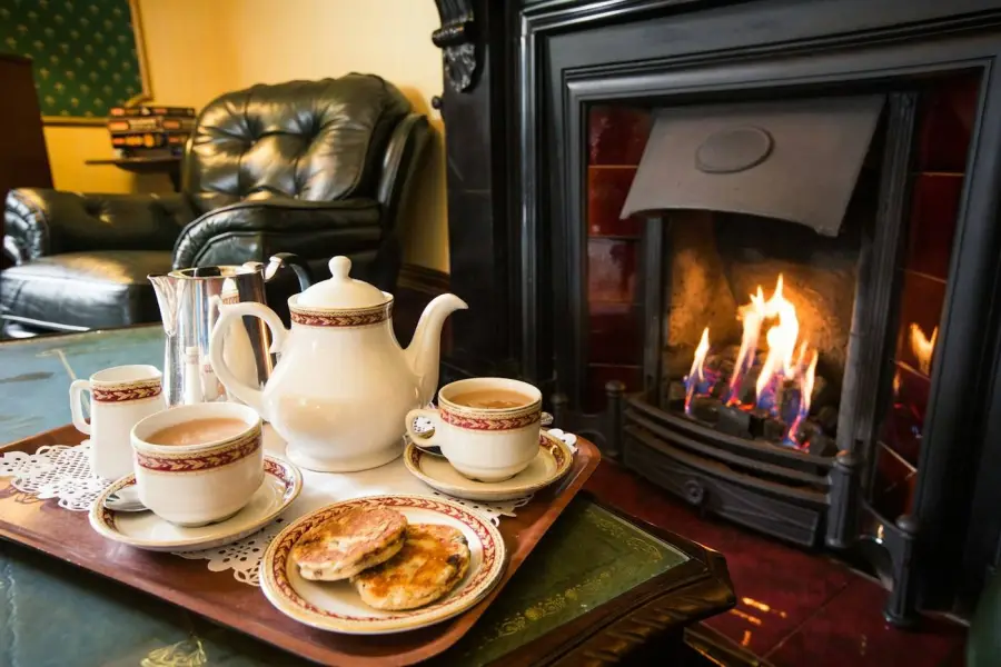 Tea and cakes by the fire